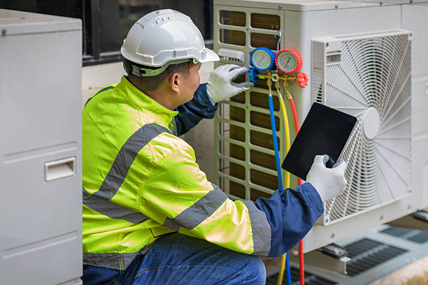 Professional Air Duct Cleaning technician working in Sherman, IL